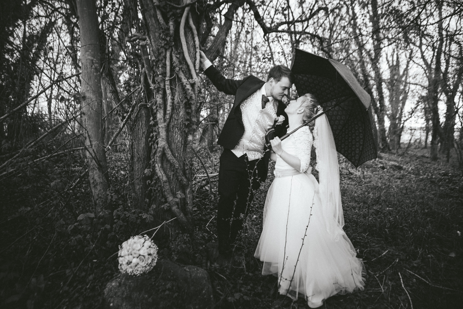Marriage under an umbrella in nature on Bornholm