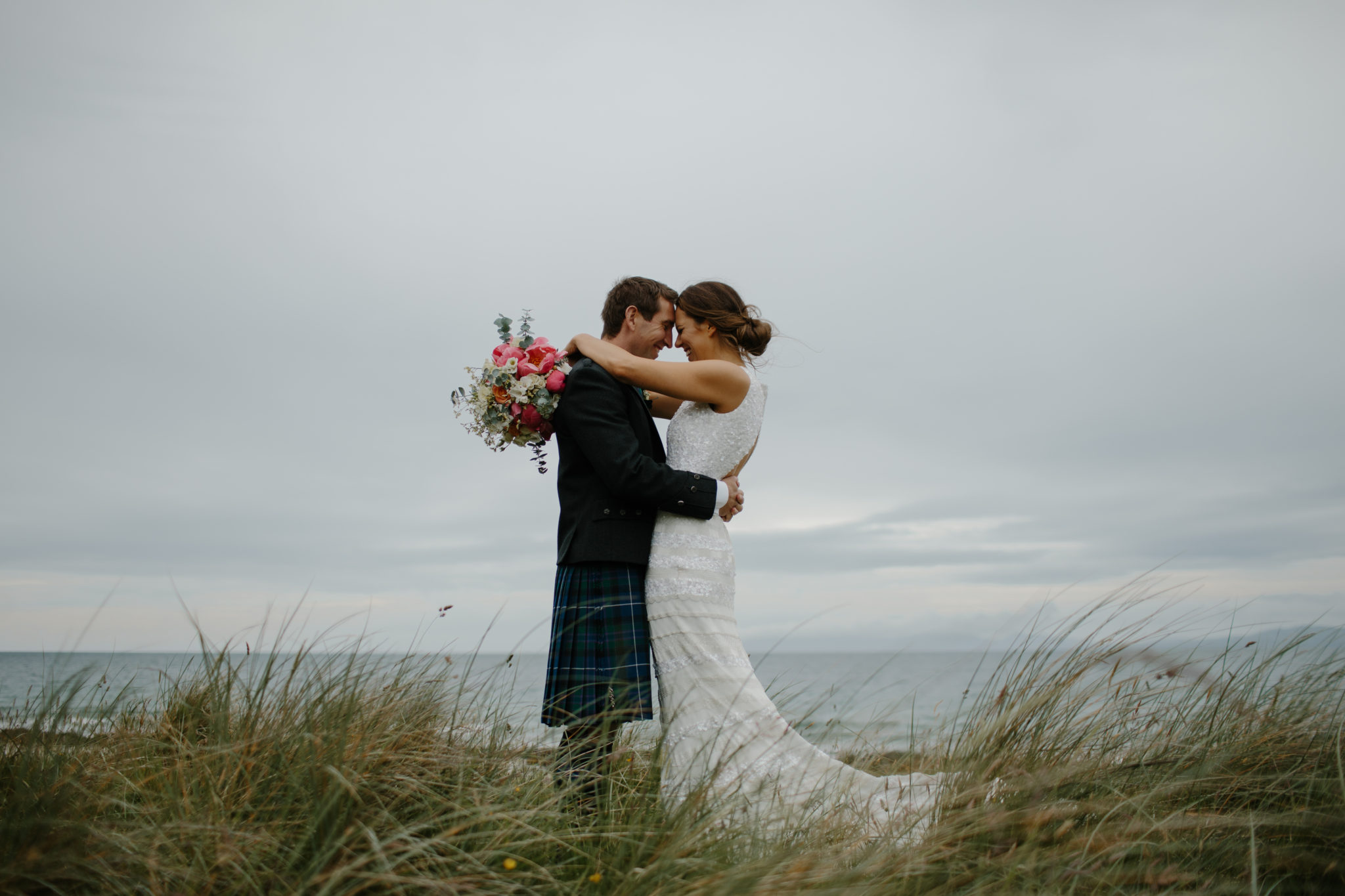 Just married couple embrace in nature on Bornholm