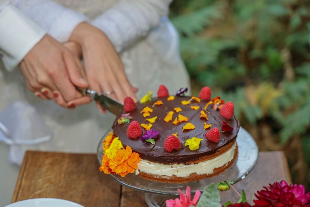 Also newly wed couples on Bornholm cut the wedding cake together as a Danish wedding tradition.