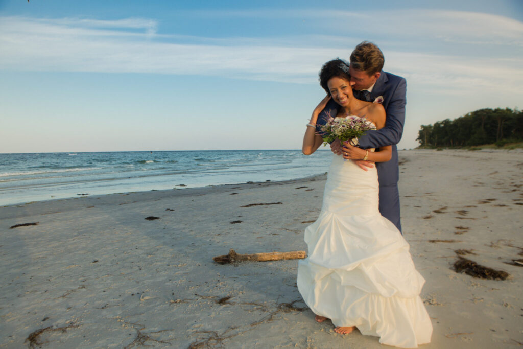 Bridal couples on the beach in nature on Bornholm