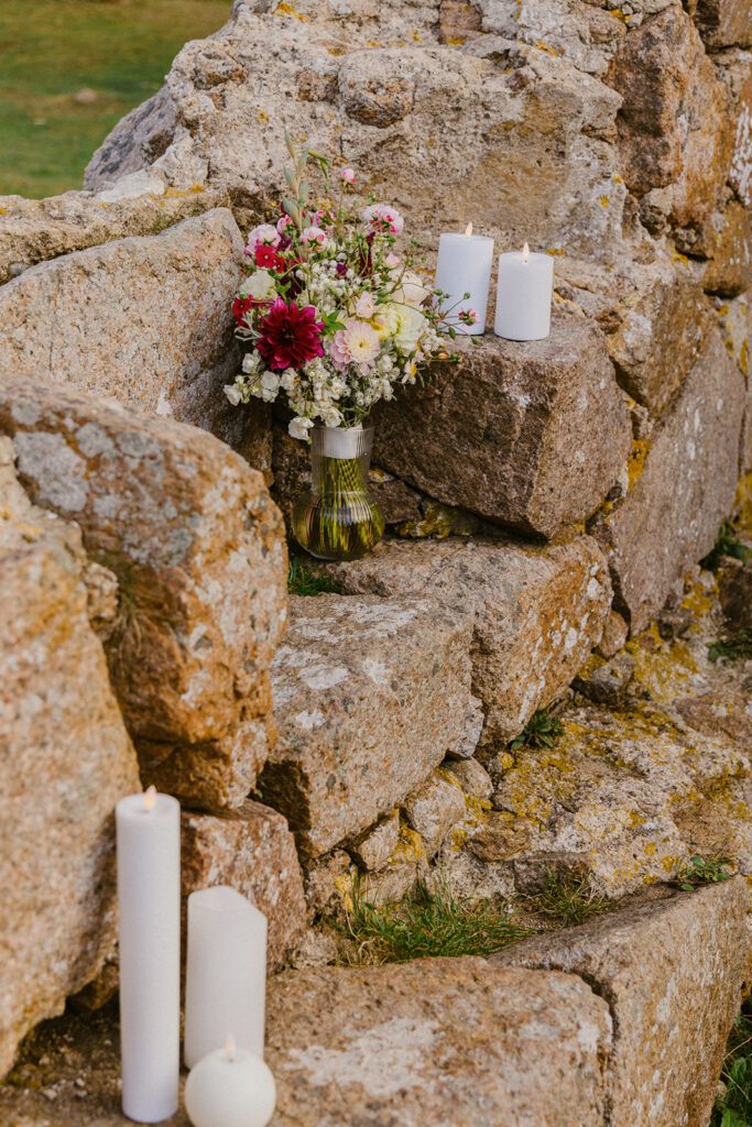 Candle light decorations on a historical site prepared for a wedding on the Danish island of Bornholm.