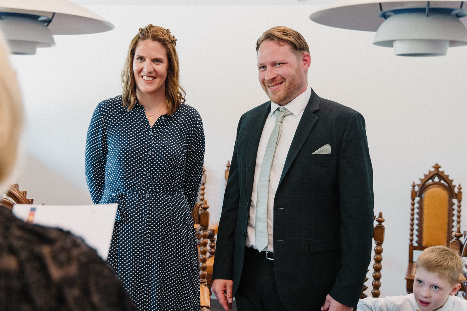 At the registry office in Bornholm, a registrar reads the wedding rites in German.