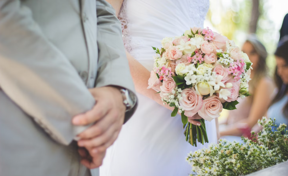 Guest post from New Zealand showing a bridal bouquet during a wedding.