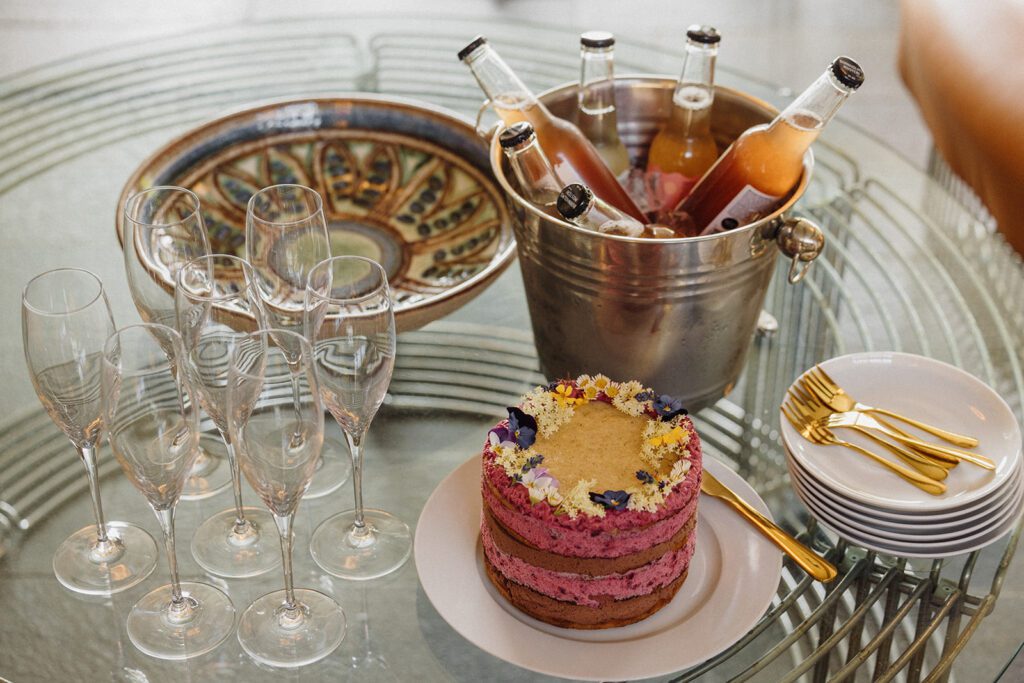 A decorated table with a small wedding cake in Denmark.