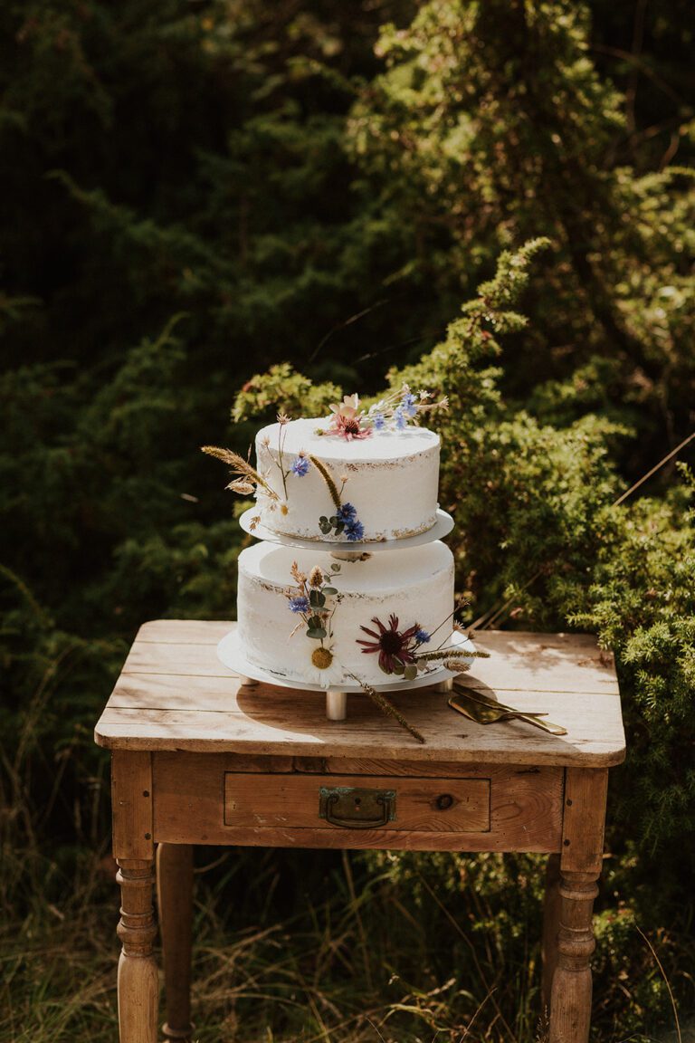 A tiered wedding cake for a wedding in the forest of Bornholm.